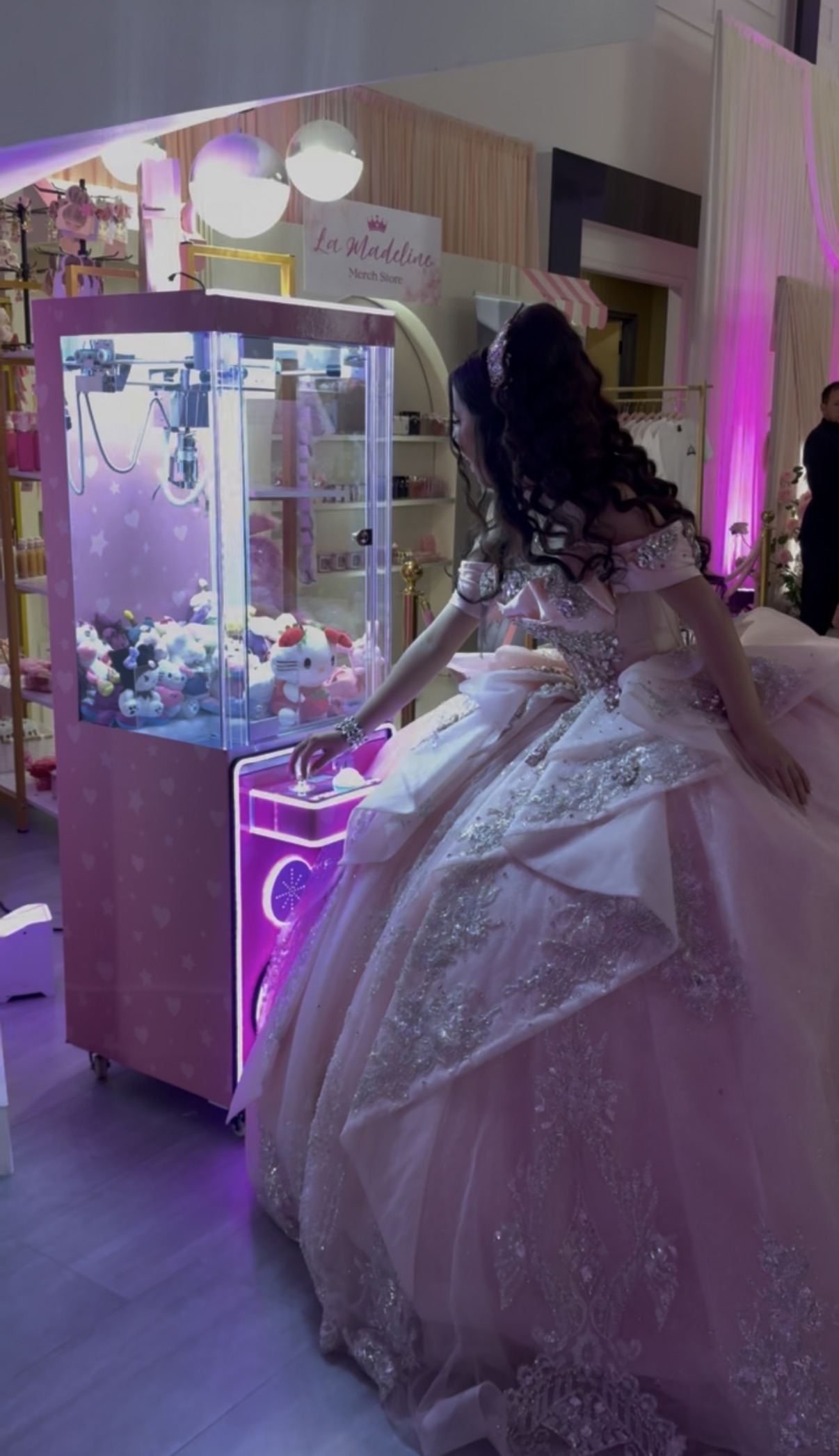 Girl enjoying the claw machine